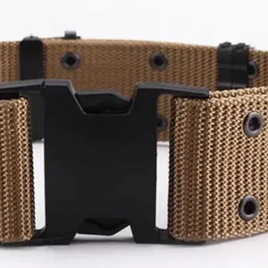 Close-up detail of a tactical outdoor canvas belt with a durable black plastic buckle