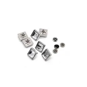 Macro view of 10mm square silver zinc alloy decorative rivets with crystal rhinestone inlay