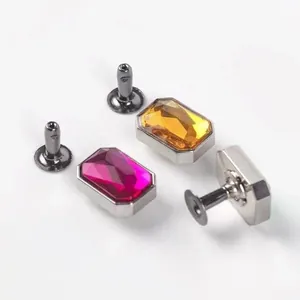 Close-up of 10mm square zinc alloy rhinestone rivets for shoe and bag decoration.