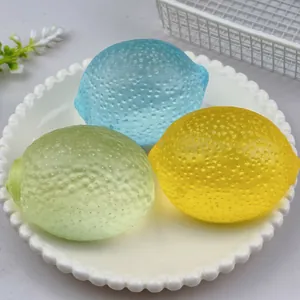 Detailed close-up of colorful lemon squeeze toys on a white plate with realistic skin texture.