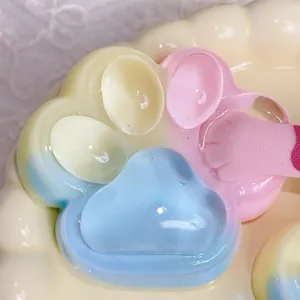 Macro detail of a soft rainbow cat paw squishy toy with translucent jelly texture