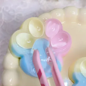 Detailed macro view of a colorful translucent cat paw squishy toy with soft texture