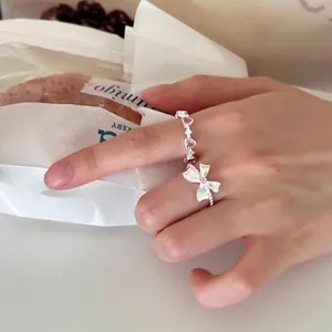 Elegante conjunto de anillos abiertos en plata S925 con lazo y cristales de corazón rosa