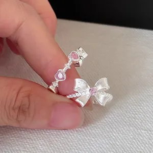 Elegante anillo de lazo en plata de ley S925 con piedras de corazón rosa estilo dulce