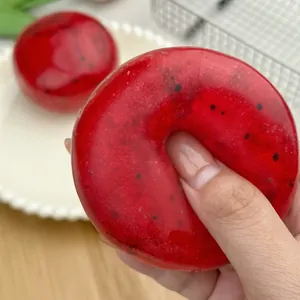 Handmade red watermelon slushie donut squishy toy for stress relief and sensory play