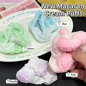 Soft macaron colored mochi squishy stress relief toys in pink blue and purple