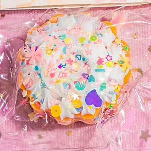 Colorful cupcake-shaped slow rebound squishy toy with vibrant sprinkles and glitter.