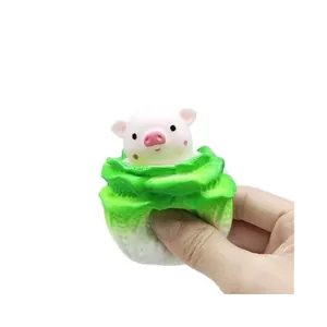 Creative cabbage pig squishy toy for stress relief in a hand-squeezed demonstration