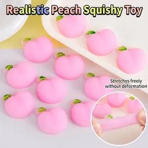 Adorable pink peach shaped squishy toys for stress relief and fun sensory play
