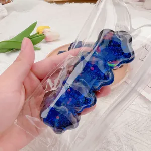 Funkelndes blaues sternförmiges Squishy-Spielzeug zum Stressabbau in transparenter Verpackung