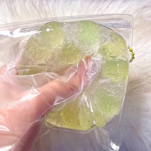 Handmade translucent green grape squishy toy for sensory play and stress relief