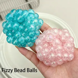 Macro detail of blue and pink pearl-textured handmade stress relief squeeze balls