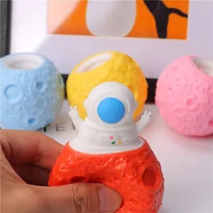 Cute astronaut planet squeeze toy for stress relief available in multiple vibrant colors