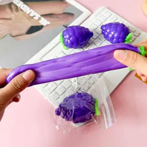 Close-up showing the stretchable texture of the purple grape squishy toy