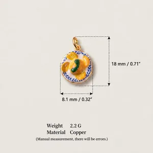 Copper pendant with citrus fruit bowl design and 18K gold finish