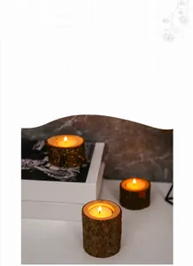 Handcrafted rustic tree stump wooden candle holders for warm and cozy home decor.