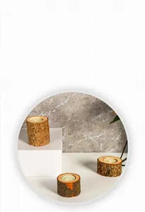 Rustic wooden candle holder detail with natural bark texture