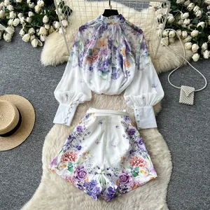Elegant floral print two-piece set with lantern sleeve top and high waist shorts