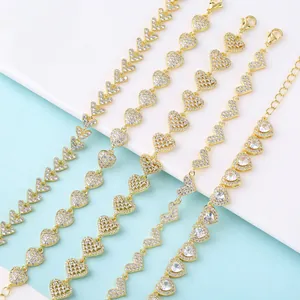 Close-up detail shot of elegant 18K gold plated heart bracelets with micro-paved CZ