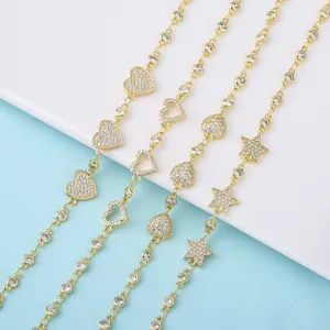Close-up of 18K gold plated heart and star bracelets with micro pave crystals.