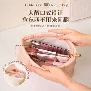 Borsa cosmetica trapuntata a griglia a bolle di grande capacità per trucco e skincare