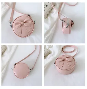 Four views of a cute pink round crossbody bag for girls with a stylish bow detail