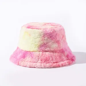 Sweet tie-dye plush bucket hat featuring a soft pink and yellow gradient fuzzy texture