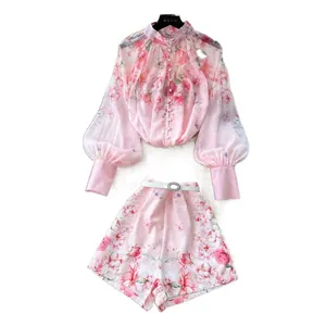 Elegant palace style floral two-piece set with lantern sleeve top and high waist shorts