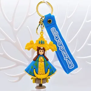 Close-up of the Virgin of San Juan de los Lagos PVC keychain with blue strap