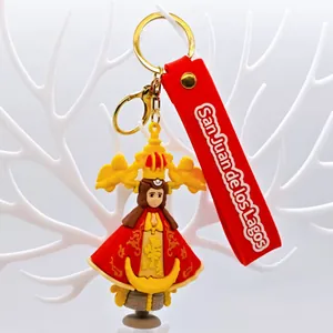 Close-up of a San Juan de los Lagos religious character soft rubber keychain charm