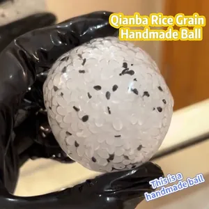 Handmade rice ball squishy toy for stress relief featuring a realistic grain texture