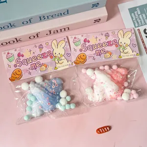 Close-up detail of colorful cream squeeze toys featuring cute bunny themed packaging