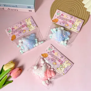 Close-up detail of cute simulation croissant squeeze toys with pastel colored packaging