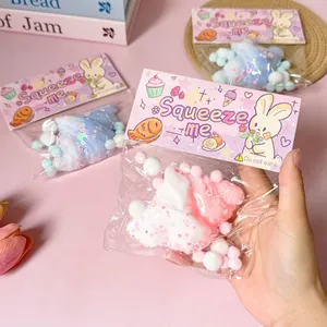 Close-up detail of pink croissant squeeze toy in cute packaging for stress relief
