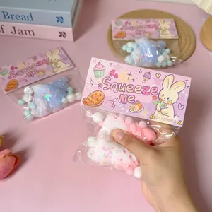 Detailed view of colorful croissant squishy toy in cute rabbit packaging for stress relief