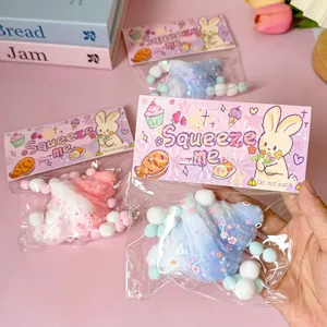 Detailed view of colorful croissant squeeze toys in cute bunny packaging
