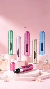 Various colors of 5ml matte portable perfume atomizers shown on display pedestals.