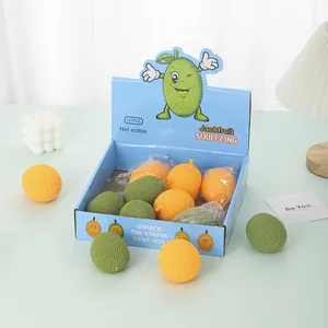 Detailed shot of realistic jackfruit squeeze toys in a display box for stress relief