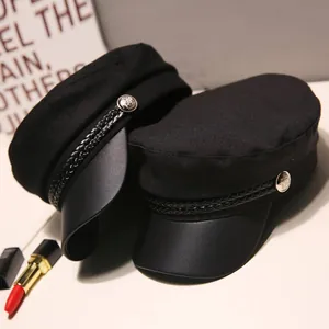Retro women's black baker boy hat with leather brim and braided rope detail styling