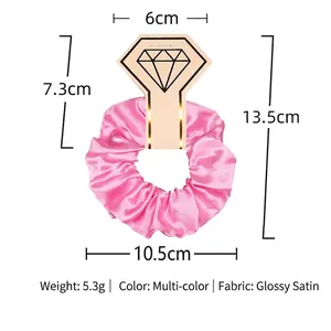 Pink shiny satin scrunchie on diamond card, 10.5cm diameter product dimensions