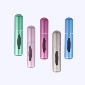 Portable 5ml refillable perfume atomizer bottles with matte finish and clear view window.