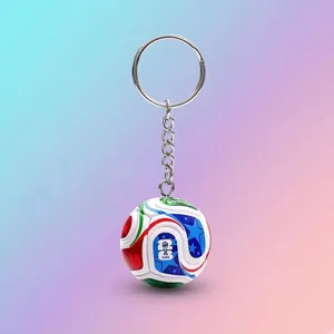 Close-up detail of a 3D soccer ball keychain featuring a sturdy metal ring and chain