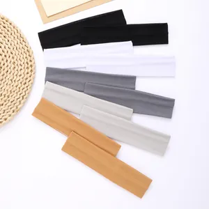 A detailed view showing multi-color thin elastic sports headbands for yoga and fitness