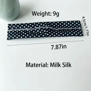 Detailed size and material specifications for polka dot elastic sports headband