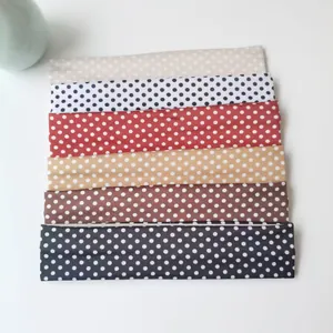 Set of six polka dot elastic sports headbands in various vibrant colors for yoga
