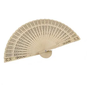Traditional hollowed-out wooden folding fan with intricate floral pattern for weddings