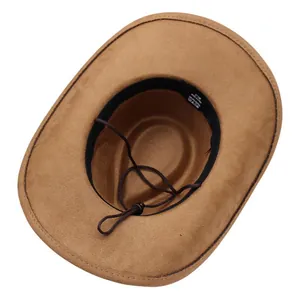 Macro view of brown suede cowboy hat interior showing sizing label and adjustable cord