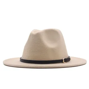 Close-up view of a beige suede jazz hat featuring a black leather band buckle detail