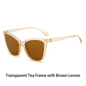 Vintage oversized cat eye sunglasses with transparent tea frame and brown lenses for women