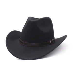 Detail shot of a black suede-like cowboy hat featuring a brown leather belt buckle band.